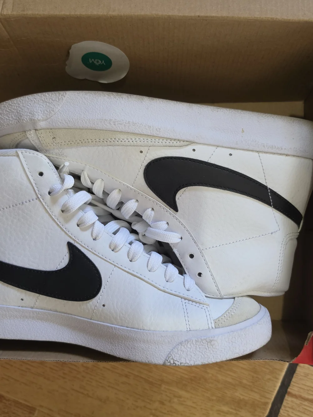 Nike Blazer White High-Top Sneakers with Black Swoosh